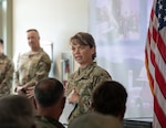 U.S. Air Force Col. Stephanie Figueroa, commander, 233rd Space Group, Colorado Air National Guard, gives a speech to the members of the 233rd regarding the retirement of the Mobile Ground Support equipment, Greeley, Colorado, Aug. 2, 2025. The MGS is a weapons system designed for survivable missile warnings and has been in operation with the Air National Guard since 1996. (U.S. Air National Guard photo by Staff Sergeant Luccario Lovato)