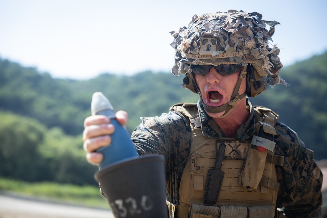 U.S. Marine Corps Cpl. Reece Frasier, a mortarman with 2nd Battalion, 23rd Marines, forward deployed with 4th Marine Regiment, 3d Marine Division as part of the Unit Deployment Program, fires an 81mm mortars during the Korean Marine Exercise Program 25.2 in Pocheon, South Korea, July 28, 2025. KMEP is conducted regularly between the ROK and U.S. Marine Corps to increase their combined capabilities through realistic training geared towards deterrence and maintaining peace in the Indo-Pacific. (U.S. Marine Corps photo by Lance Cpl. Van Hoang)