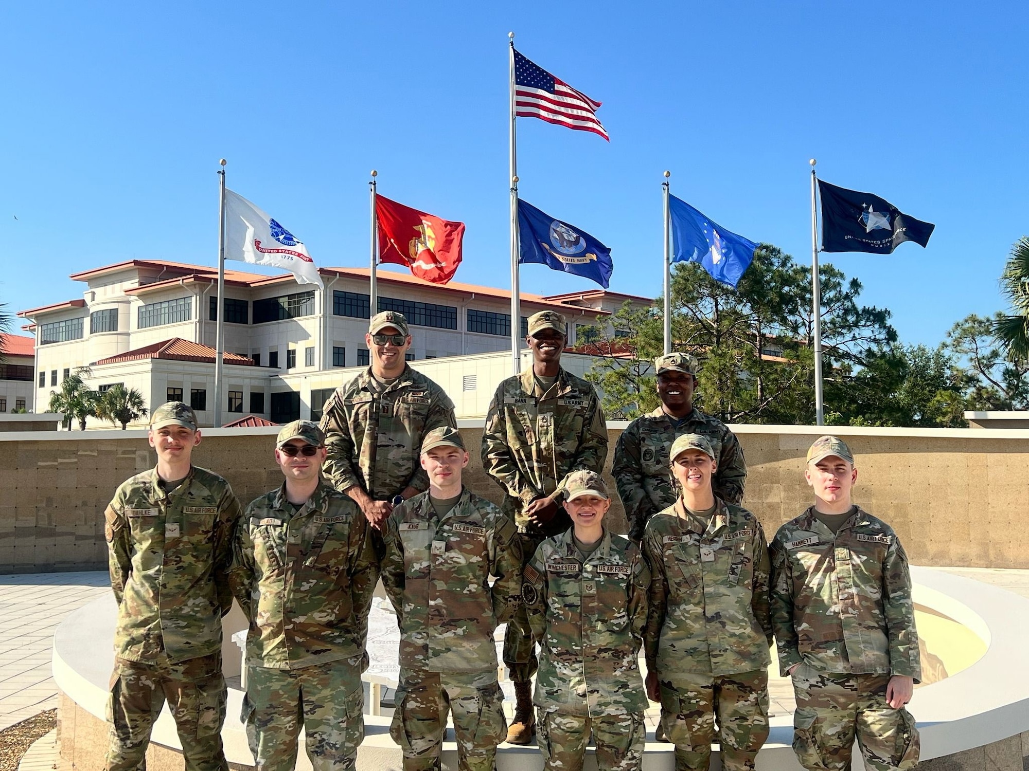 U.S. Airmen from the J-6 Joint Communication Control Watch pose for a photo during a deployment at McDill Air Force Base, Florida April 2025.
