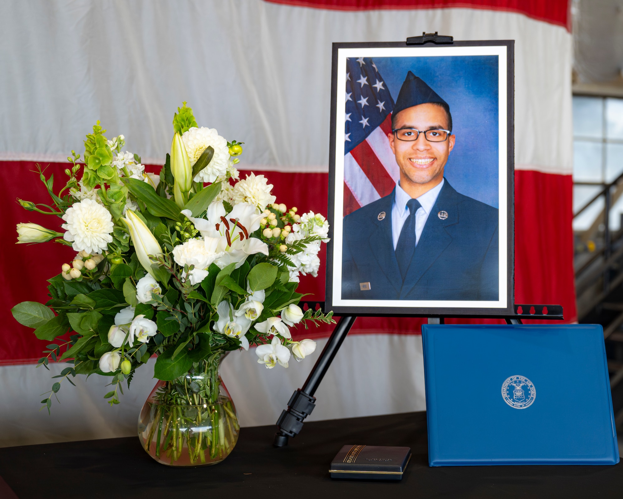 A photo of a memorial service for a 388th Fighter Wing Airman