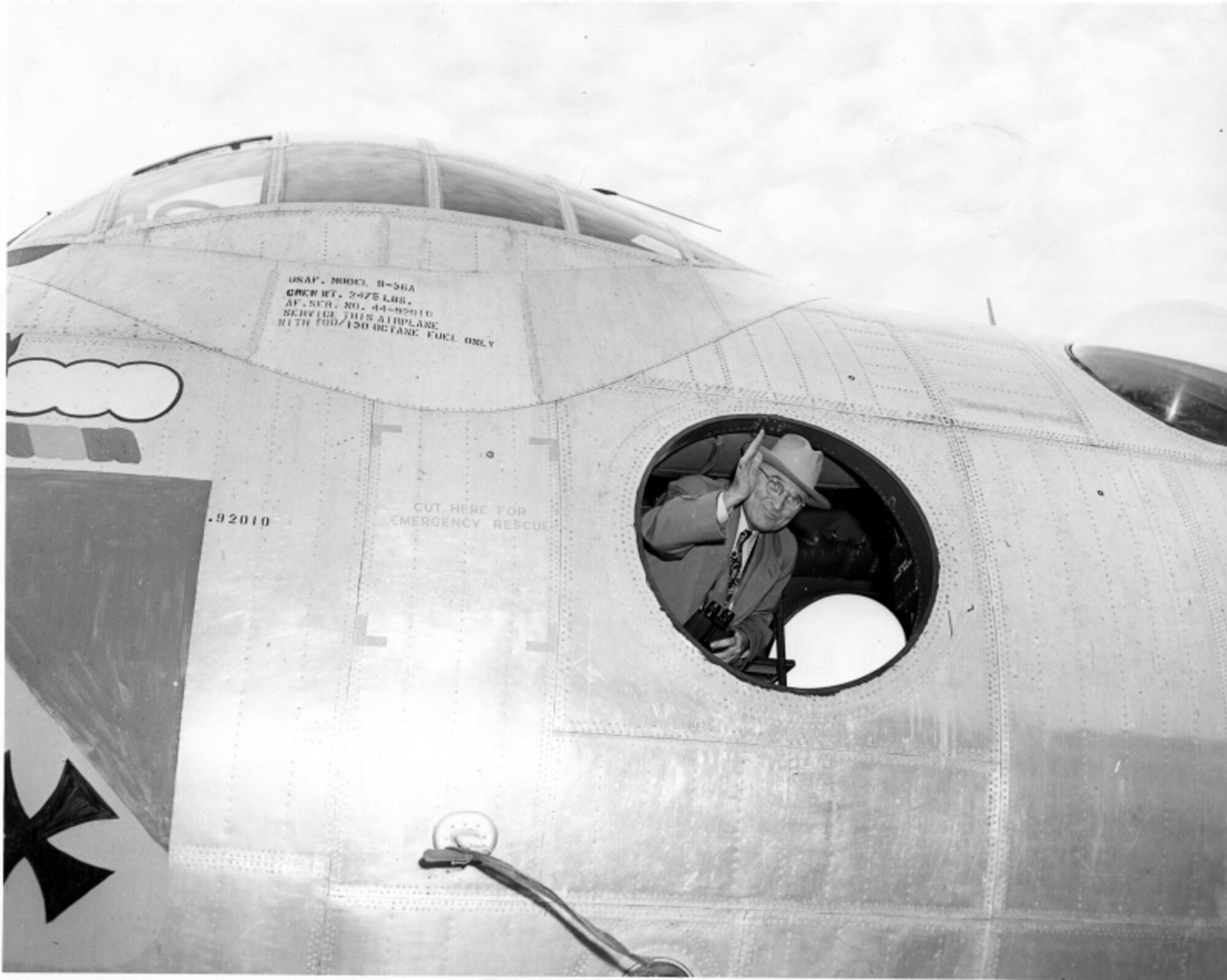 President Harry S. Truman waves from inside a B-36A Peacemaker, at an air show at Andrews Air Force Base, Maryland, February 15, 1949.