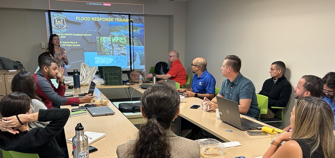Group of people meeting about hurricane preparedness.