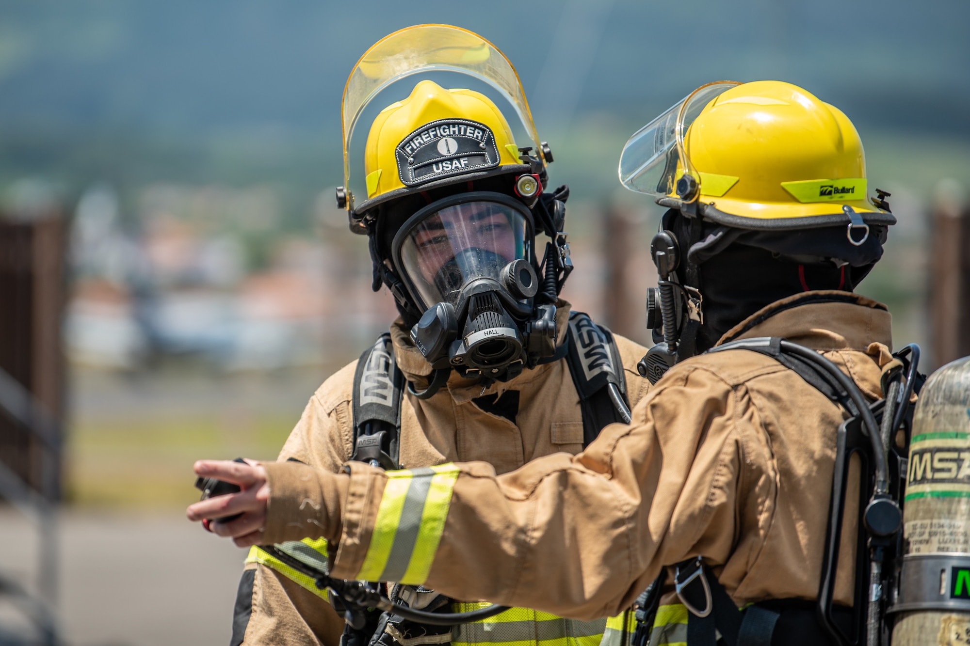 Airman 1st Class Kentaro Hall, a fire protection specialist from the Kentucky Air National Guard’s 123rd Civil Engineer Squadron, prepares for a simulated aircraft burn at Lajes Field, Azores, June 23, 2025. The exercise was staged by the Portuguese military to help prepare Guardsmen for fire crisis scenarios. (U.S. Air National Guard photo by Airman 1st Class Angelee Barnett)