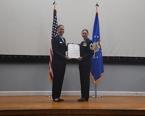 Chief Master Sgt. Rhonda Gambill retires from the Air Force after serving nearly 30 years of total military service. Chief Gambill, who began her military career as a Marine, retired as the Senior Enlisted Leader for the 459th Mission Support Group at Joint Base Andrews, Md. Gambill held her retirement ceremony at the 459th Air Refueling Wing. Maj. Melissa Greenwood, 46th Aerial Port Squadron, Dover AFB, Del., officiated the ceremony. (U.S. Air Force photo by Lt. Col. Timothy Smith)