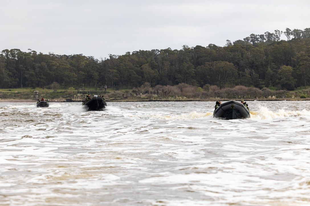 Uruguayan Infantes de Marina ride rigid inflatable boats during a subject matter expert exchange in Uruguay, August 14, 2025. This subject matter expert exchange enhances the training and readiness standards for the United States and Uruguay as well as facilitating the exchange of formalized readiness standards between both countries. (U.S. Marine Corps photo by Sgt. Eduardo Delatorre)