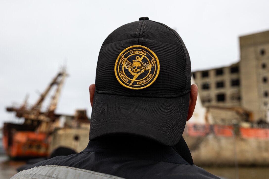 Sub Oficial de Segunda John Gonzalez, jefe del peloton de embarcaciones wears a unit hat during a subject matter expert exchange in Uruguay, August 14, 2025. This subject matter expert exchange enhances the training and readiness standards for the United States and Uruguay as well as facilitating the exchange of formalized readiness standards between both countries. (U.S. Marine Corps photo by Sgt. Eduardo Delatorre)