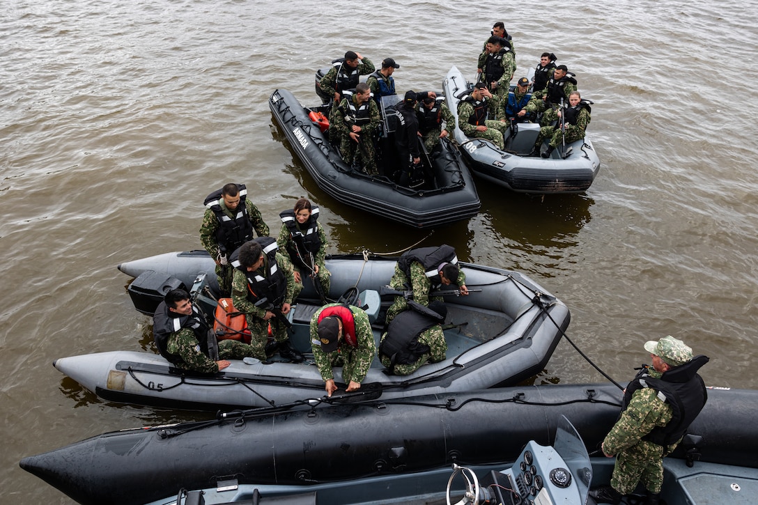 Uruguayan Infantes de Marina dock rigid inflatable boats during a subject matter expert exchange in Uruguay, August 14, 2025. This subject matter expert exchange enhances the training and readiness standards for the United States and Uruguay as well as facilitating the exchange of formalized readiness standards between both countries. (U.S. Marine Corps photo by Sgt. Eduardo Delatorre)