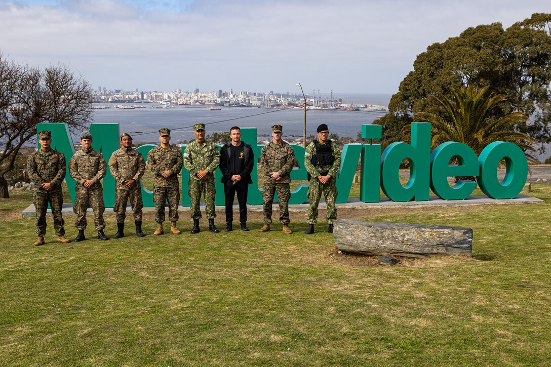 U.S. Marines and Uruguayan service members pose for a picture during a subject matter expert exchange in Uruguay, August 14, 2025. This subject matter expert exchange enhances the training and readiness standards for the United States and Uruguay as well as facilitating the exchange of formalized readiness standards between both countries. (U.S. Marine Corps photo by Sgt. Eduardo Delatorre)