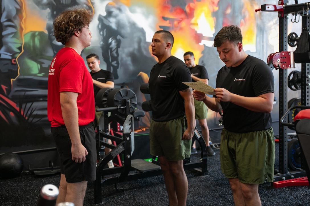 U.S. Marine Corps poolee Lewis Relaferd, with Recruiting Sub Station Mansfeild, Recruiting Station Fort Worth, receives a certificate during their pool function  at Silverback Fit Gym in Kennedale, Texas, Aug. 9, 2025.The annual pool function serves as an opportunity to PT and learn about the opportunities the Marine Corps can provide during and after enlisting. (U. S. Marine Corps photo by Lance Cpl. Abram Maestre)