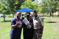 Maj. Gen. Rodney Boyd presents his coin to 8th Infantry Association members