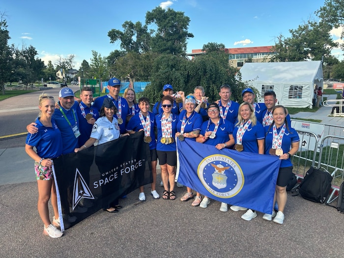U.S. Air Force 2025 DoD Warrior Games swim team group together for a photo in Colorado Springs, Colorado, July 26, 2025. The Warrior Games were established to enhance the recovery and rehabilitation of wounded, ill and injured service members and to expose them to adaptive sports. (U.S. Air Force Courtesy Photo)