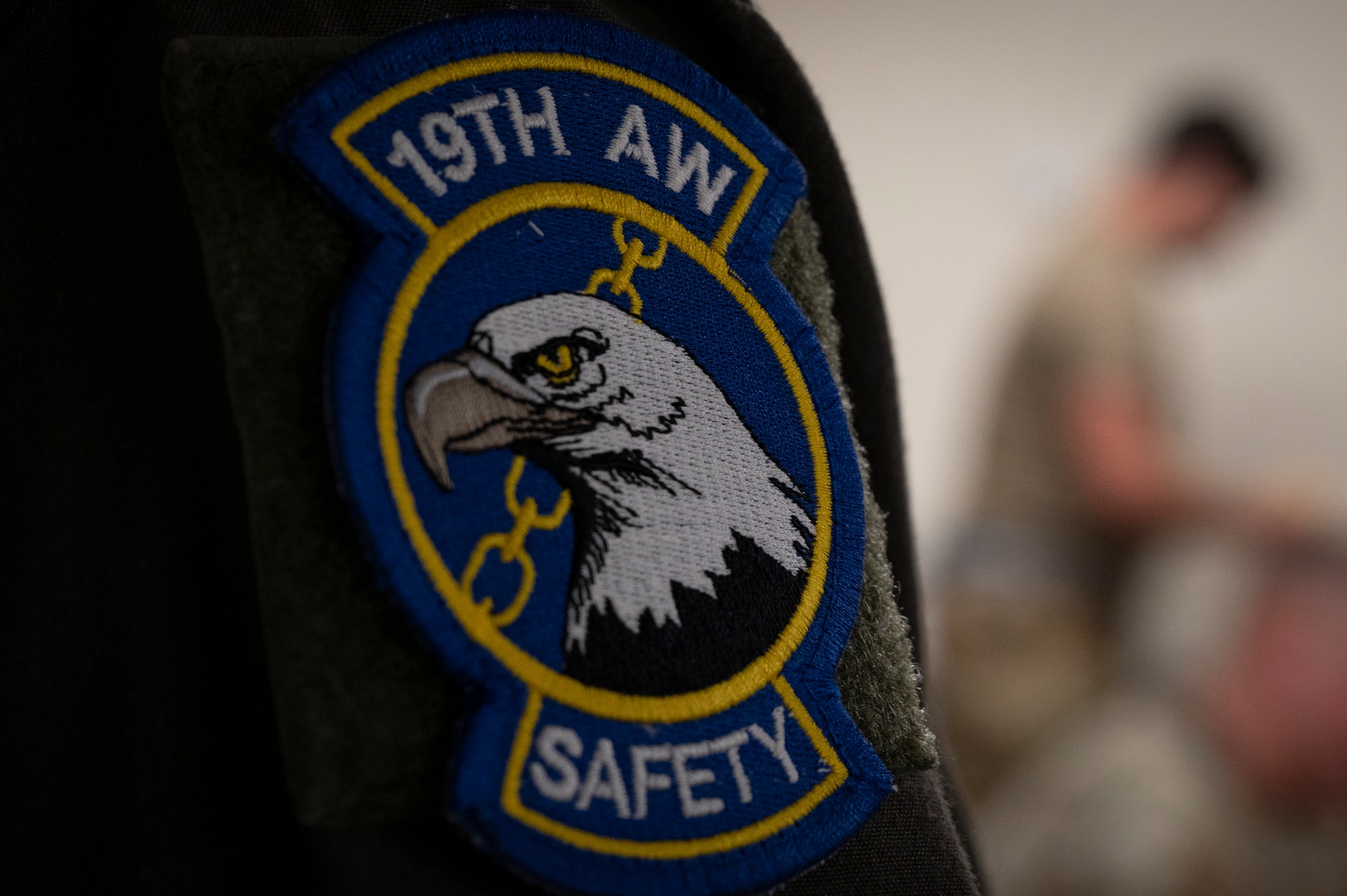 U.S. Air Force Capt. Christopher Gonzales, chief of flight safety assigned to the 19th Airlift Wing, speaks with Airmen at Andersen Air Force Base, Guam, during the Air Force’s 2025 Department-Level Exercise series, July 23, 2025. Air Mobility Command safety personnel ensured mission readiness by identifying hazards and mitigating risks for Airmen during the DLE. The DLE series encompasses all branches of the Department of Defense, along with allies and partners, employing more than 400 Joint and coalition aircraft and more than 12,000 members at more than 50 locations across 3,000 miles. (U.S. Air Force photo by Staff Sgt. Dalton Williams)