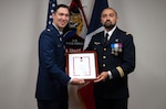 A french soldier presents an award to a U.S. Space Force Soldier.