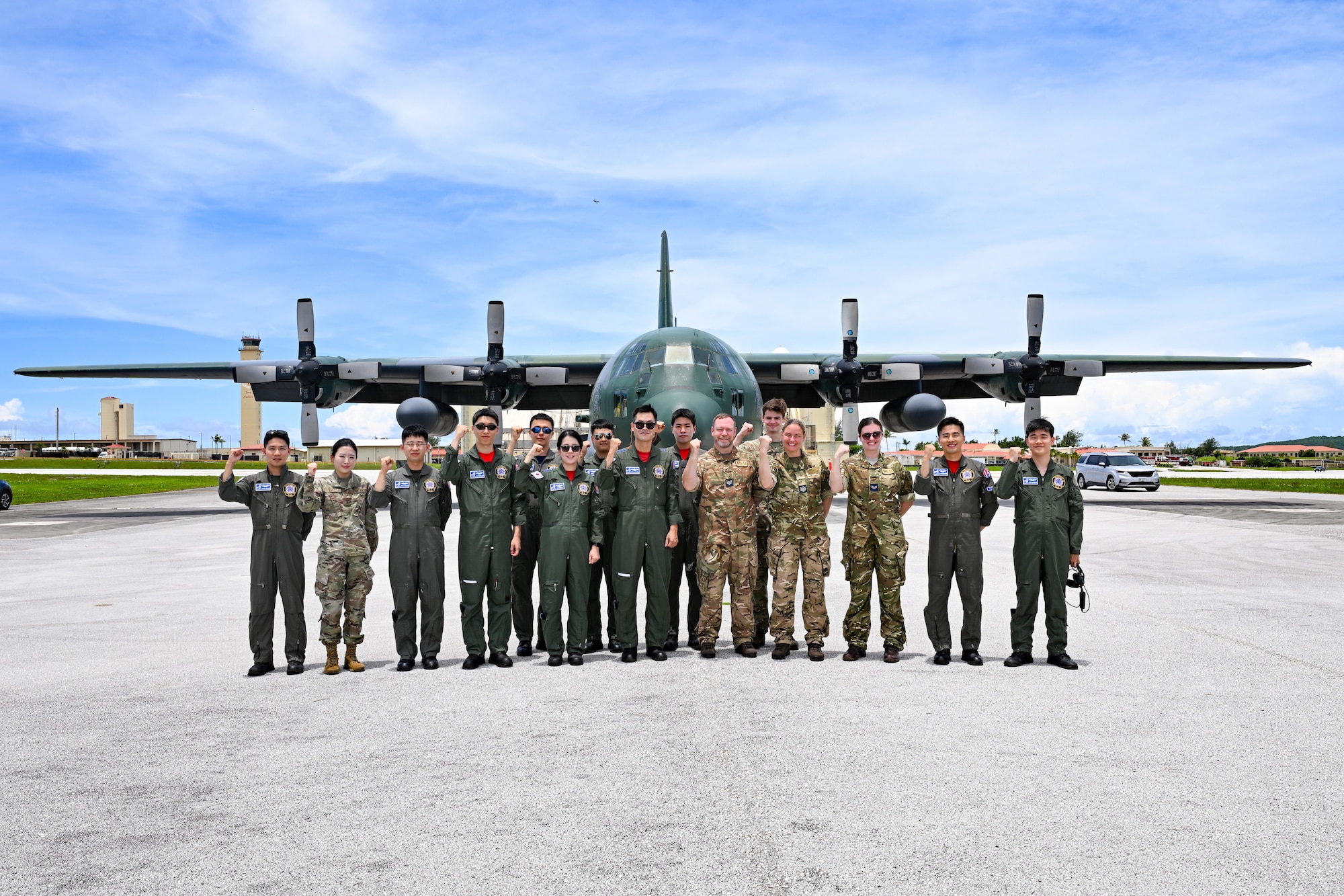 Republic of Korea Air Force members take a photo with U.S. Air Force 1st Lt. Esther Kim, Space Systems Command director of contracting and Language Enabled Airman Program participant, Los Angeles Air Force Base, California, during the U.S. Air Force’s 2025 Department-Level Exercise series at Andersen Air Force Base, Guam, July 28, 2025. LEAP empowers the DLE by enhancing linguistic and cultural interoperability, enabling more effective collaboration and mission success with partners and allies. DLE 2025 is a new way of conducting operations in a contested, dynamic environment to build capabilities, making a stronger, more deterrent force. The DLE encompasses all branches of the Department of Defense, along with Allies and partners, employing more than 400 Joint and coalition aircraft and more than 12,000 members at more than 50 locations across 3,000 miles. (Courtesy photo by ROKAF)