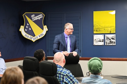 John Faulkner, 88th Air Base Wing technical director, briefs the Miami Valley Higher Education Consortium.