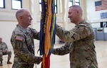 Brig. Gen. Eastridge passes colors to Col. Kowalski, Aug. 17, 2025.