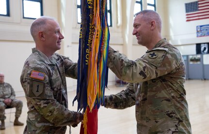 Brig. Gen. Eastridge passes colors to Col. Kowalski, Aug. 17, 2025.