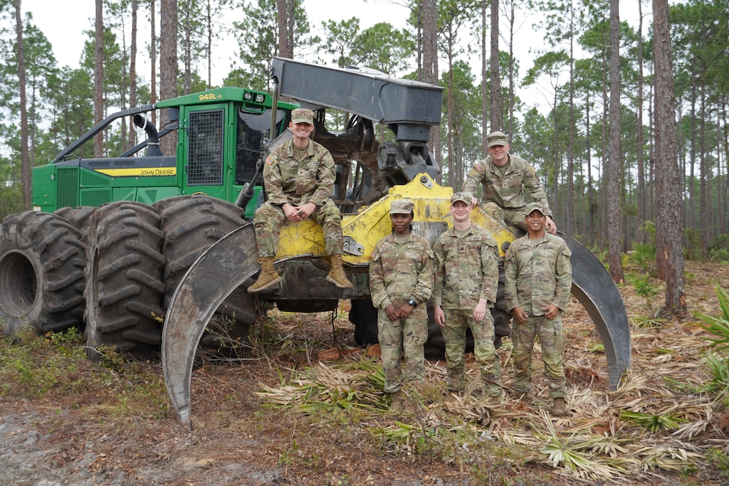 Army Reserve Officers’ Training Corps cadets pose for a photo with a grapple skidder during a forestry management tour at Fort Stewart, Georgia, Aug. 8, 2025. The Cadets are assigned to the U.S. Army Corps of Engineers, Savannah District for their summer internship.