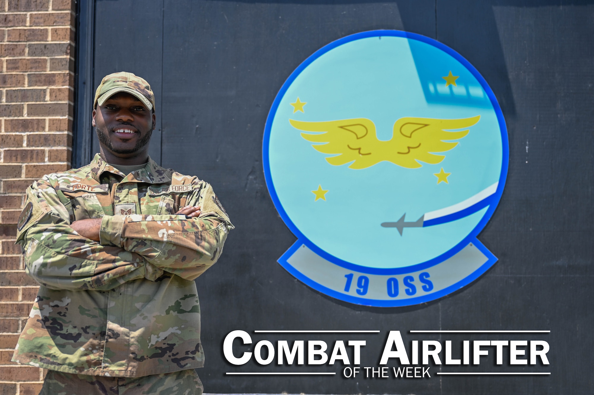 A man in uniform poses for a photo.