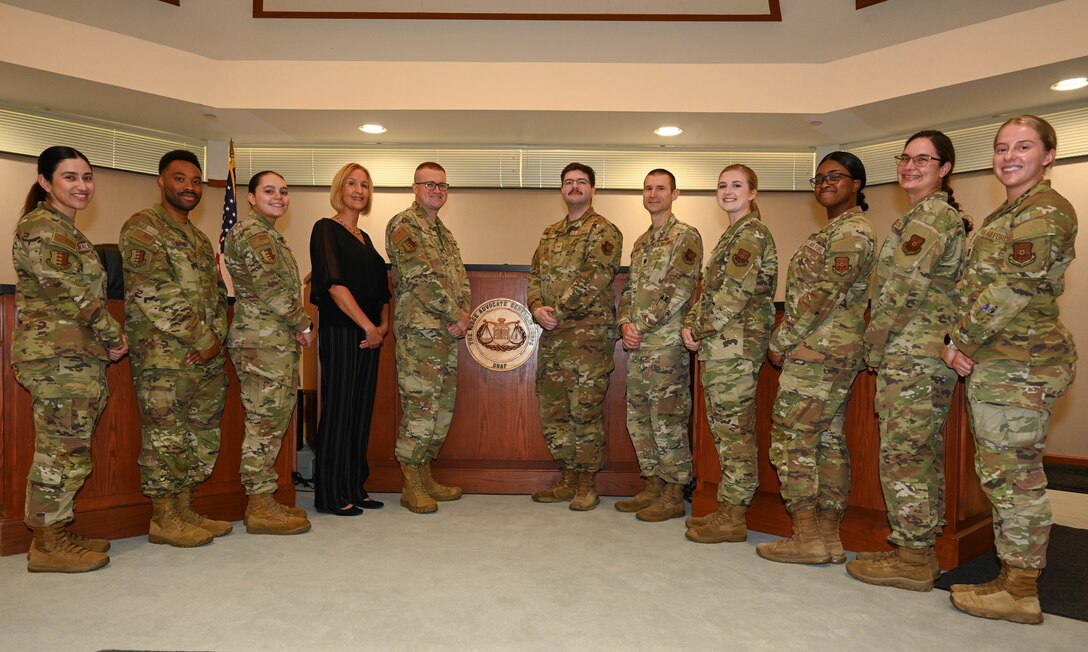 Members of Ellsworth’s Staff Judge Advocate team pose for a group photo at Ellsworth Air Force Base, South Dakota, Aug. 18, 2025. The team was recently named 2024 Legal Office of the Year by the Department of the Air Force, surpassing 83 other legal offices in the DAF. (U.S. Air Force photo by Airman 1st Class Addison Bolt)