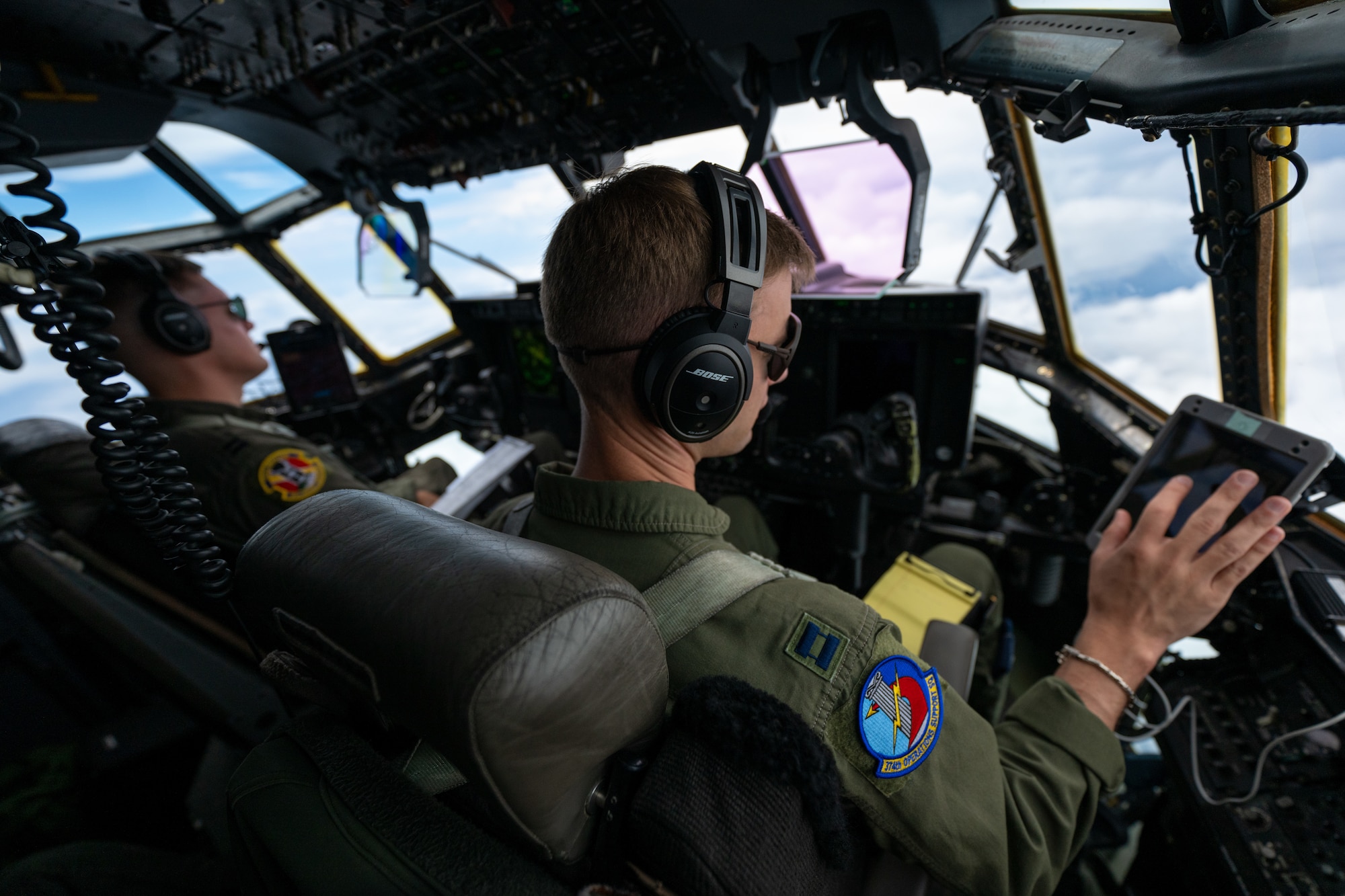 U.S. Air Force pilots fly a C-130J Super Hercules aircraft out of Yokota Air Base, Japan, to deliver fuel to Marines at an undisclosed location, July 15, 2025. Air Mobility Command aircraft enable local, routine training and operations to deliver rapid global mobility, ensuring U.S. and Allied forces can project power and respond swiftly anywhere in the world. With a fleet of versatile aircraft, AMC provides the critical capability to transport personnel, equipment, and supplies when and where needed. (U.S. Air Force photo by Tech. Sgt. Nicholas Monteleone)