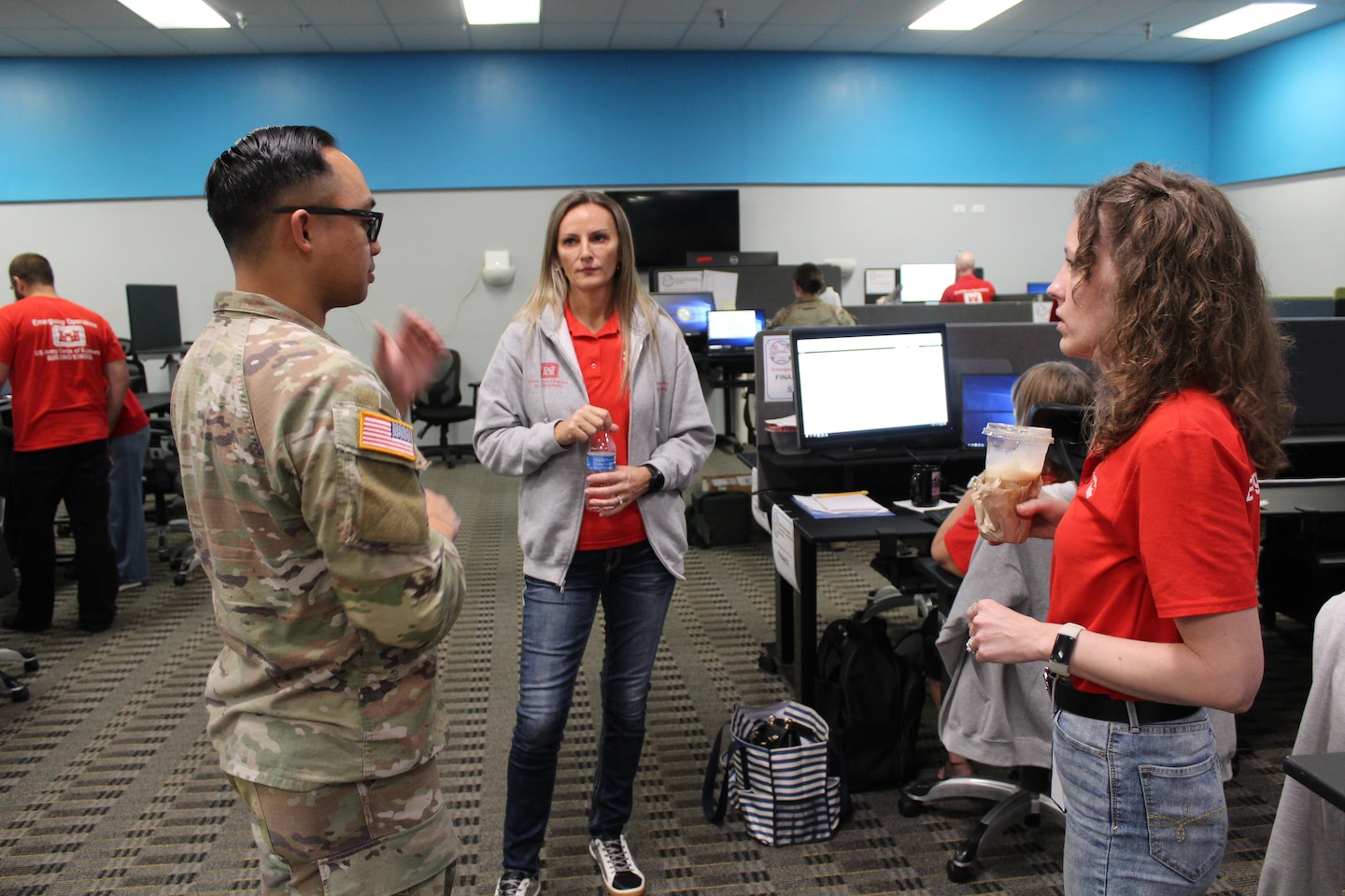 (Right) Ashley Foster, an Emergency Management Specialist with the Jacksonville District, talks with deployment members
Emergency Field Office during Hurricane Milton in Sarasota, Fla. Foster was recently named the 2024 USACE Emergency
Management Specialist of the Year.(USACE photo by Mark Rankin)