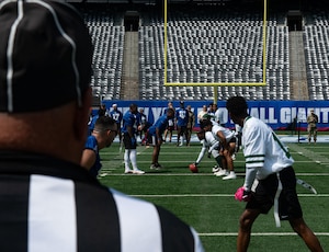 Service members from Joint Base McGuire-Dix-Lakehurst, N.J., and Fort Hamilton, N.Y., play in the annual Salute to Service Bowl at MetLife Stadium, N.J., Aug. 16, 2025. Team JB MDL scored the winning point, making them champions for the fourth year in a row.