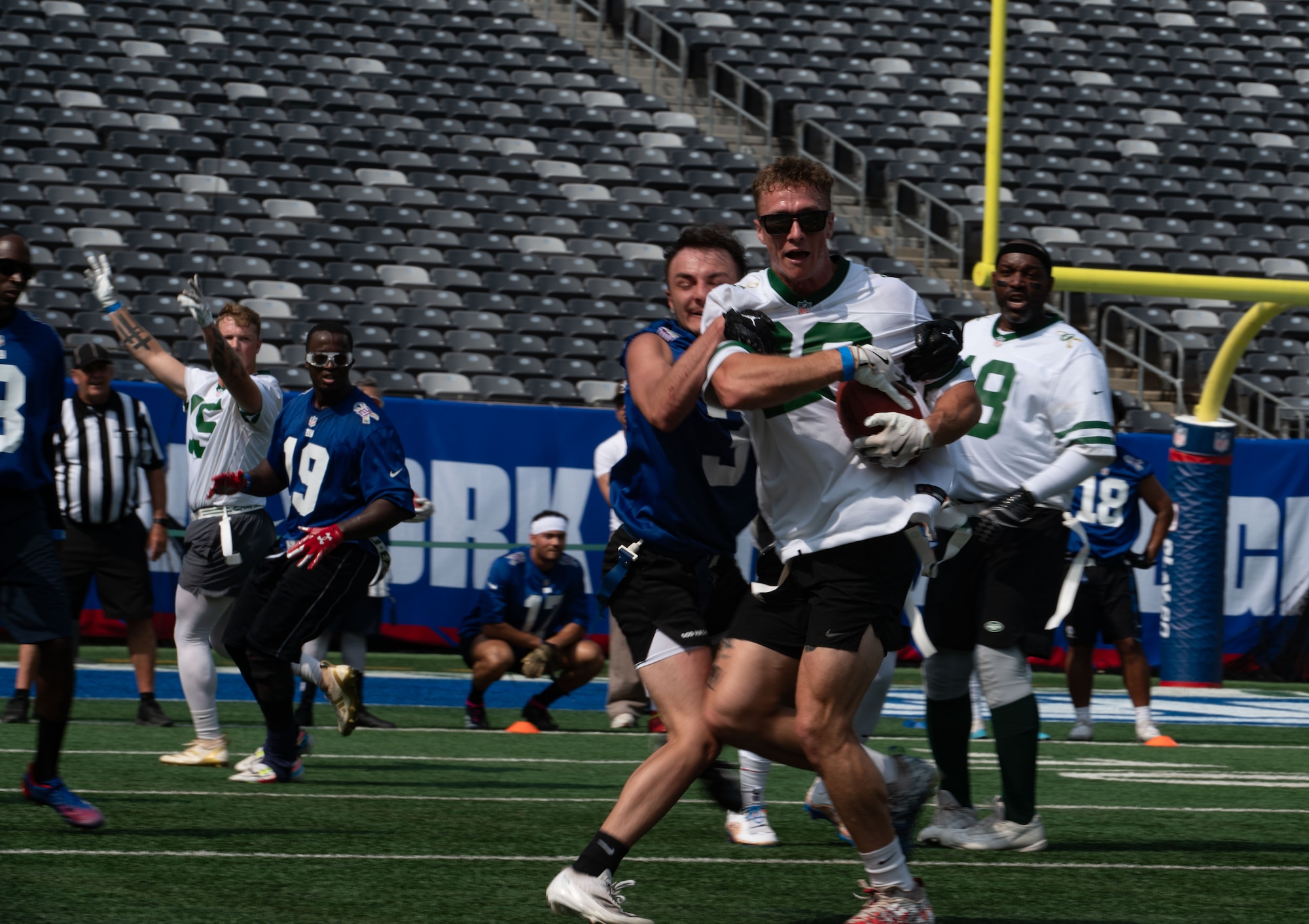 Service members from Joint Base McGuire-Dix-Lakehurst, N.J., score against Fort Hamilton N.Y., during the annual Salute to Service Bowl at MetLife Stadium, N.J., Aug. 16, 2025. The game is organized each year by the New York Jets and the New York Giants to honor service members from each of the armed forces.