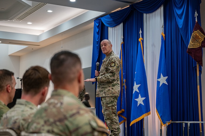 Airman at a ceremony posing for a photo.