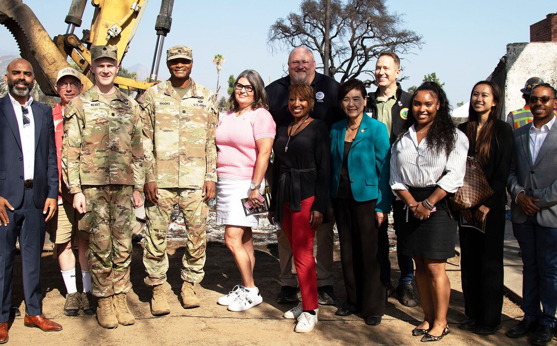 Leaders with the U.S. Army Corps of Engineers, FEMA Federal Emergency Management Agency, California Governor's Office of Emergency Services, County of Los Angeles, Altadena Town Council, Congresswoman Judy Chu and community members pose for a picture following an Aug. 14 ceremony in honor of the debris removal from the final private property assigned to USACE that was impacted by the Eaton Fires in Altadena, California.