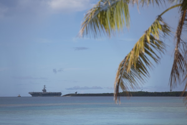 APRA HARBOR, Guam (Aug. 17, 2025) Nimitz-class aircraft carrier USS George Washington (CVN 73) arrives in Guam for a scheduled port visit, Aug. 17. George Washington is the U.S. Navy’s premier forward-deployed aircraft carrier, a long-standing symbol of the United States’ commitment to maintaining a free and open Indo-Pacific region, operating alongside allies and partners across the U.S. 7th Fleet area of responsibility. (U.S. Navy photo by Lt. Cmdr. Michelle Tucker)