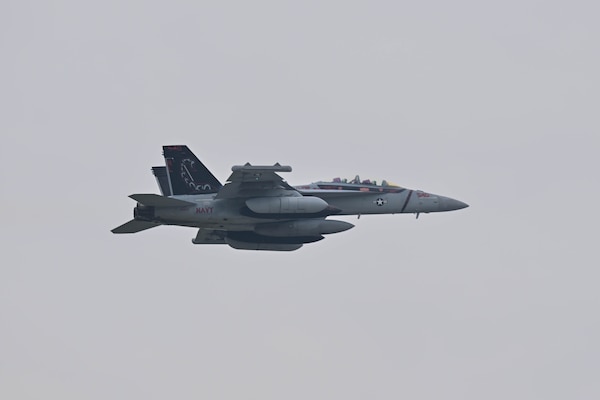 A U.S. Navy EA-18G Growler assigned to the Electronic Attack Squadron 132 (VAQ-132), Naval Air Station Whidbey Island, Wash., soars through the air during exercise Northern Edge 2025 at Eielson Air Force Base, Alaska, Aug. 17, 2025.