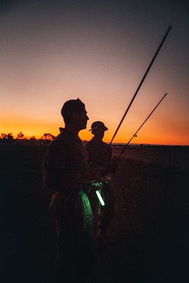 U.S. Marine Corps 1st Lt. Josias Valdez, a motor transport platoon commander with Combat Logistics Battalion 1, Marine Rotational Force – Darwin 25.3, communicates with inbound MV-22B Ospreys during a mass casualty in the Northern Territory, Australia, July 21, 2025.