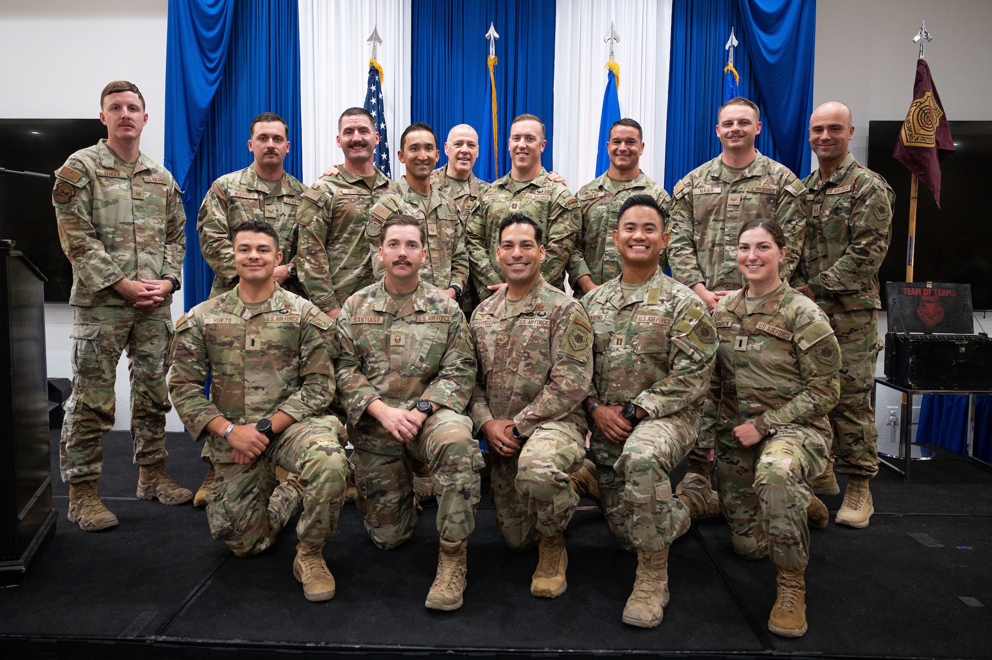 Airman at a ceremony posing for a photo.