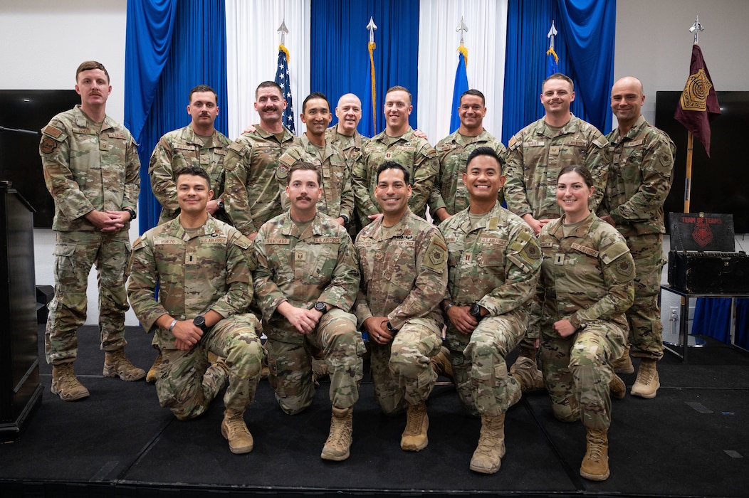 Airman at a ceremony posing for a photo.