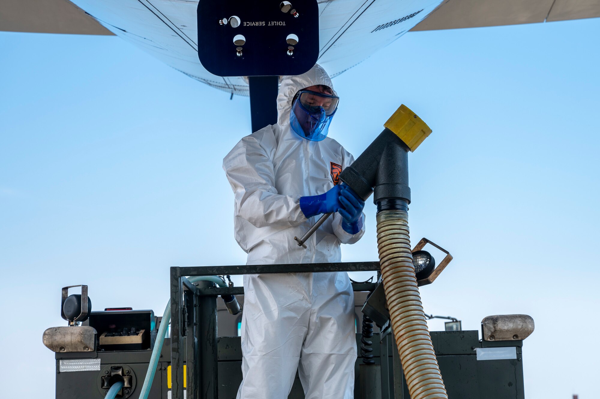 U.S. Air Force Airman 1st Class Benjamin Brenner, 730th Air Mobility Squadron air freight technician, services the lavatory on a Boeing 767 passenger aircraft in support of Resolute Force Pacific 2025 at Yokota Air Base, Japan, July 24, 2025. The 730th AMS Fleet Services team ensures all military and commercial aircraft are fully functional and ready for departure. REFORPAC is part of the first-in-a-generation Department-Level Exercise series, a new way of conducting operations in a contested, dynamic environment to build capabilities making a stronger, more deterrent force. The DLE encompasses all branches of the Department of Defense, Allies, and partners, employing over 400 joint and coalition aircraft and more than 12,000 personnel across more than 50 locations spanning 3,000 miles. (U.S. Air Force photo by Airman 1st Class Samantha Thorn)