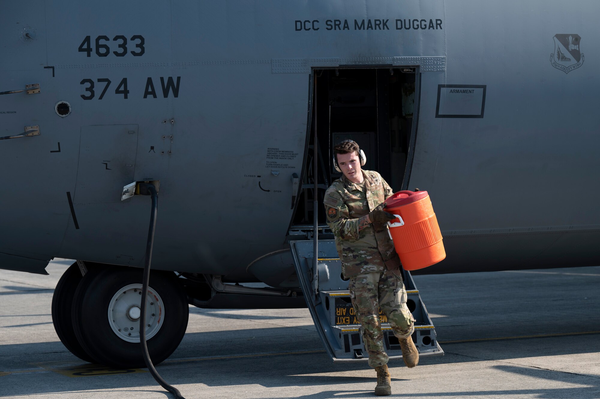 U.S. Air Force Staff Sgt. Killian Rippey, 730th Air Mobility Squadron passenger services supervisor, provides potable water to a C-130J Super Hercules aircraft during Resolute Force Pacific 2025 at Yokota Air Base, Japan, July 25, 2025. The 730th AMS Fleet Services team ensures military and commercial aircraft are mission-ready by stocking essential supplies, removing waste, and servicing lavatories. REFORPAC is part of the first-in-a-generation Department-Level Exercise series, a new way of conducting operations in a contested, dynamic environment to build capabilities making a stronger, more deterrent force. The DLE encompasses all branches of the Department of Defense, Allies, and partners, employing over 400 joint and coalition aircraft and more than 12,000 personnel across more than 50 locations spanning 3,000 miles. (U.S. Air Force photo by Airman 1st Class Samantha Thorn)