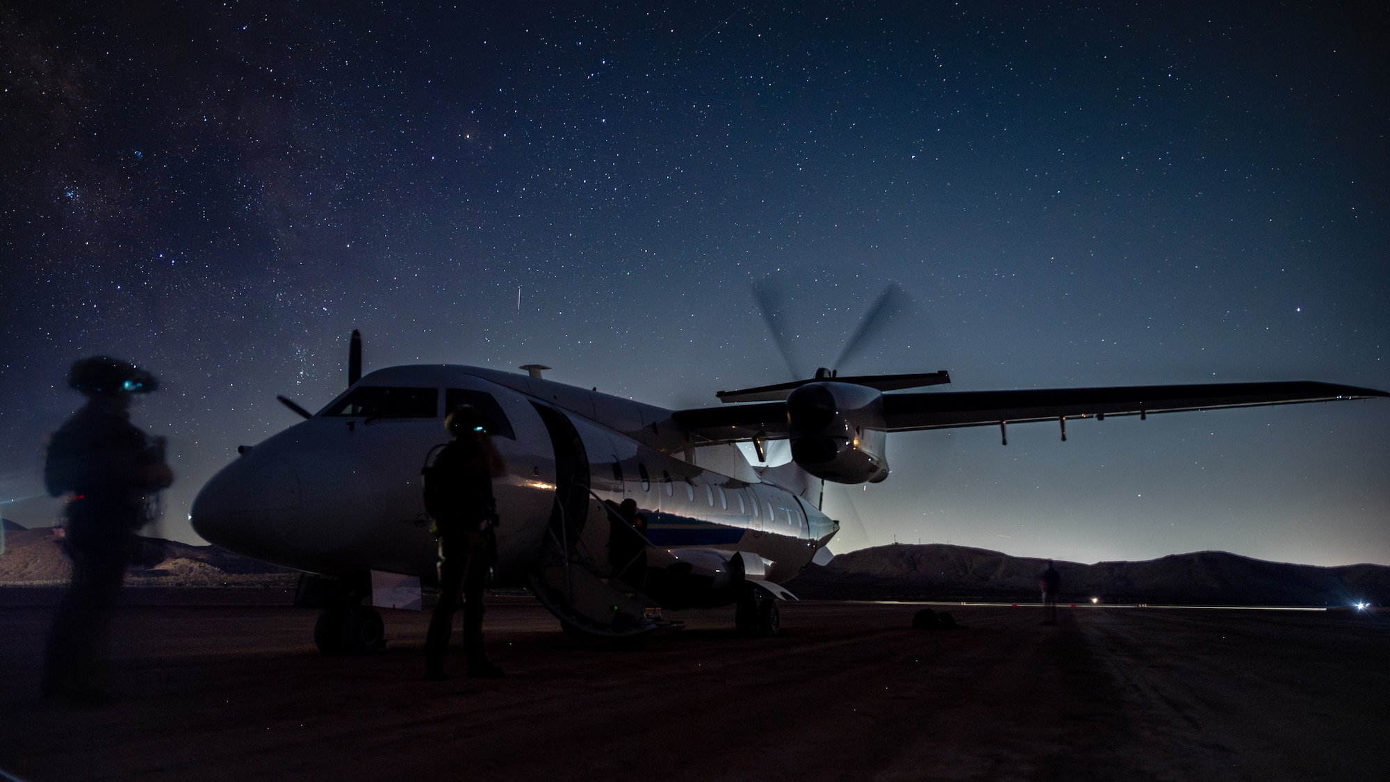AFSOC Air Commandos establish a perimeter around a C-146A Wolfhound aircraft during Emerald Warrior 25.2.