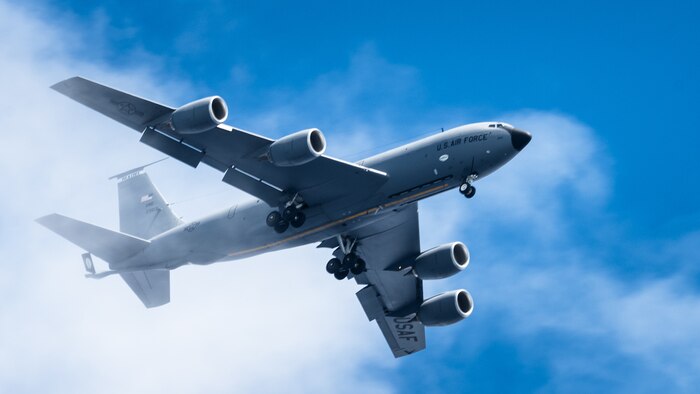 A U.S. Air Force KC-135 Stratotanker aircraft flies by the 81st Liberation Day Parade, leveraging a training sortie during the U.S. Air Force's 2025 Department-Level Exercise series in Guam, July 21, 2025. The flights consisted of 13 waves of aircraft from the U.S. Air Force, Royal New Zealand Air Force, Japan Air Self-Defense Force, Republic of Korea Air Force, and Royal Australian Air Force, showcasing the U.S. and its allies’ commitment to a free and open Indo-Pacific region. The DLE encompasses all branches of the Department of Defense, Allies, and partners, employing over 400 joint and coalition aircraft and more than 12,000 personnel across more than 50 locations spanning 3,000 miles. (U.S. Air Force photo by Senior Airman Jade M. Caldwell)