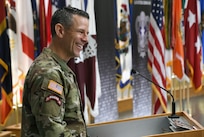 Col. Marc Welde speaks after passing command of U.S. Army Medical Logistics Command to Col. Deon Maxwell during a change of command ceremony Aug. 15 at Fort Detrick, Md. (C.J. Lovelace)