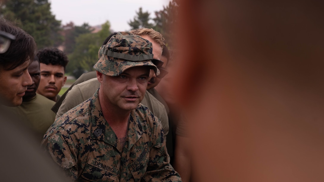 U.S. Marine Corps 1st Sgt. Aaron Denning, the company first sergeant of Golf Company, 2nd Battalion, 23rd Marines, forward deployed with 4th Marine Regiment, 3d Marine Division as part of the Unit Deployment Program, speaks to his Marines before a tug of war match as part of an end of exercise celebration competition during the Korean Marine Exercise Program 25.2 in Pohang, South Korea, Aug. 9, 2025. KMEP is conducted regularly between the ROK and U.S. Marine Corps to increase their combined capabilities through realistic training geared towards deterrence and maintaining peace in the Indo-Pacific.  (U.S. Marine Corps photo by Cpl. Kanoa Thomas)