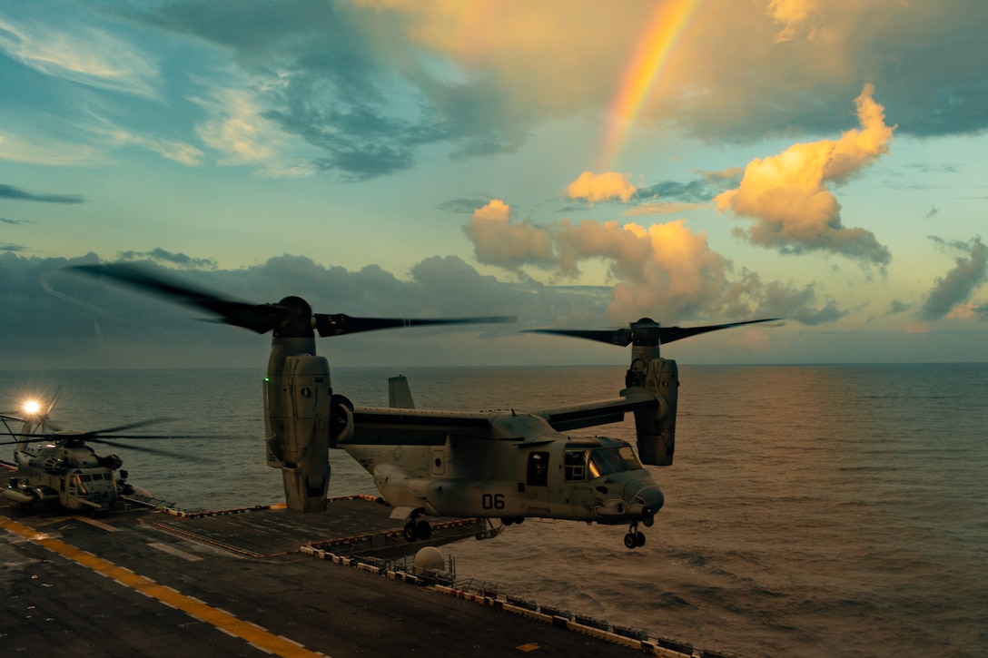 A U.S. Marine Corps MV-22 Osprey helicopter with the 22nd Marine Expeditionary Unit prepares to land aboard the U.S. Navy Wasp-class amphibious assault ship USS Iwo Jima (LHD 7), during onload operations while underway in the Atlantic Ocean. The 22nd MEU conducted onload operations to enhance readiness in support of their regularly scheduled deployment. (U.S. Marine Corps photo by Cpl. Emily Hazelbaker)