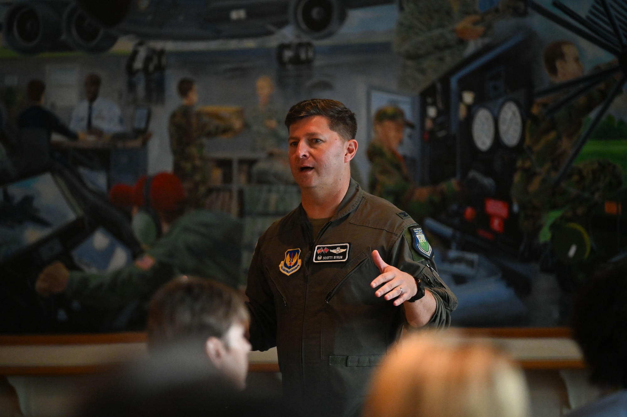 U.S. Air Force Col. Steven Byrum, 100th Air Refueling Wing commander, gives a briefing during the 100th ARW’s Key Leader Engagement Day on RAF Mildenhall, England, Aug. 14, 2025.