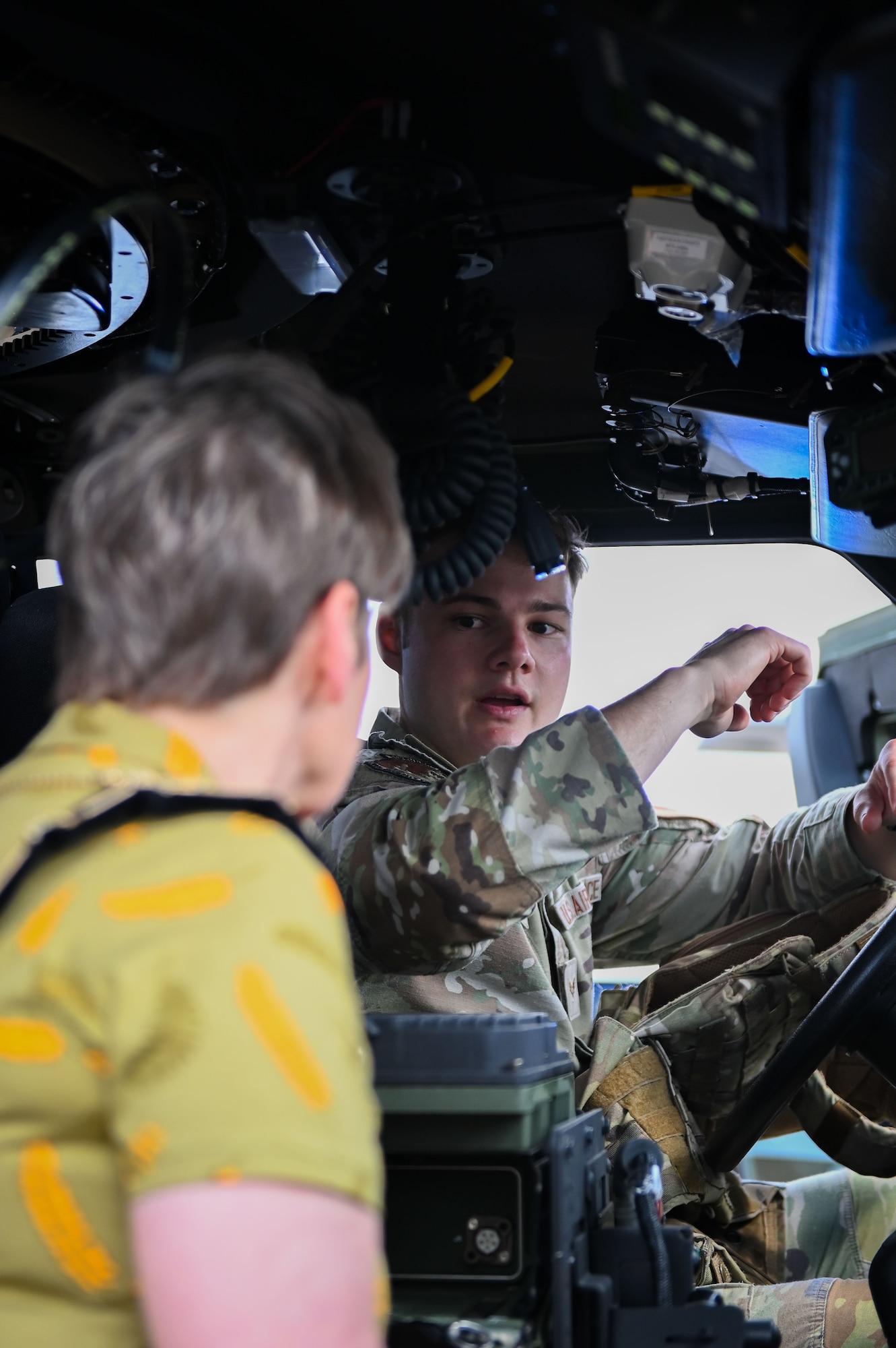 U.S. Air Force Airman, assigned to the 100th Air Refueling Wing Security Forces Squadron, demonstrates aspects of a joint light tactical vehicle (JLTV) during the 100th ARW’s Key Leader Engagement Day on RAF Mildenhall, England, Aug. 14, 2025.