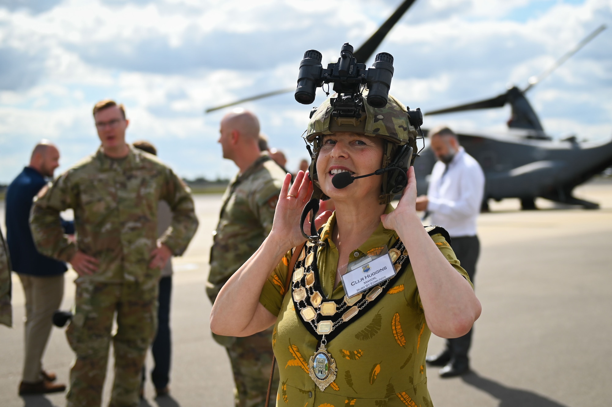 Councilor Donna Huggins, Mayor of Bury St. Edmunds, tries on accessories provided by the 100th Security Forces Squadron during the 100th ARW’s Key Leader Engagement Day on RAF Mildenhall, England, August 14, 2025.