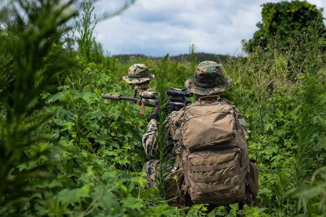 U.S. Marines with 2nd Battalion, 23rd Marines, forward deployed with 4th Marine Regiment, 3d Marine Division as part of the Unit Deployment Program, secure a helicopter landing zone alongside Republic of Korea Marines during the Korean Marine Exercise Program 25.2 in Pohang, South Korea, August 5, 2025. KMEP is conducted regularly between the ROK and U.S. Marine Corps to increase their combined capabilities through realistic training geared towards deterrence and maintaining peace in the Indo-Pacific. (U.S. Marine Corps photo by Lance Cpl. Van Hoang)