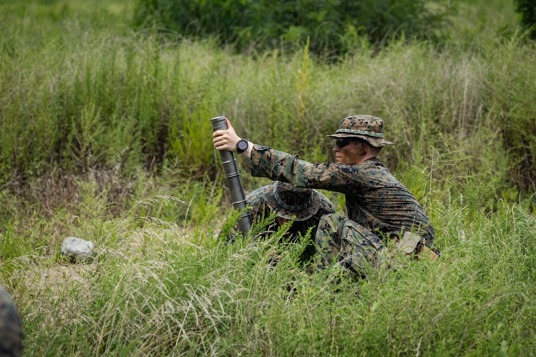 U.S. Marines with 2nd Battalion, 23rd Marines, forward deployed with 4th Marine Regiment, 3d Marine Division as part of the Unit Deployment Program, conduct a simulated fire-mission with 60mm mortars at enemy positions during the Korean Marine Exercise Program 25.2 in Pohang, South Korea, August 5, 2025. KMEP is conducted regularly between the ROK and U.S. Marine Corps to increase their combined capabilities through realistic training geared towards deterrence and maintaining peace in the Indo-Pacific. (U.S. Marine Corps photo by Lance Cpl. Van Hoang)