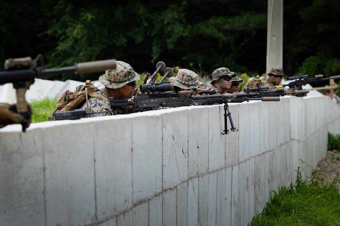 U.S. Marines with 2nd Battalion, 23rd Marines, forward deployed with 4th Marine Regiment, 3d Marine Division as part of the Unit Deployment Program, suppress simulated enemy positions during an amphibious assault during the Korean Marine Exercise Program 25.2 in Pohang, South Korea, August 5, 2025. KMEP is conducted regularly between the ROK and U.S. Marine Corps to increase their combined capabilities through realistic training geared towards deterrence and maintaining peace in the Indo-Pacific. (U.S. Marine Corps photo by Lance Cpl. Van Hoang)