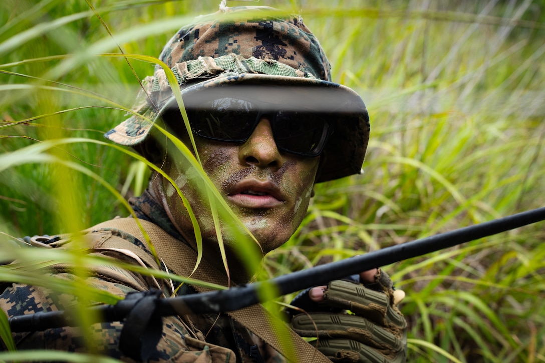 U.S. Marine Corps Sgt. Joshiwa Juni, a squad leader with 2nd Battalion, 23rd Marines, forward deployed with 4th Marine Regiment, 3d Marine Division as part of the Unit Deployment Program, communicates to another squad using an AN/PRC-152A radio during the Korean Marine Exercise Program 25.2 in Pohang, South Korea, August 5, 2025. KMEP is conducted regularly between the ROK and U.S. Marine Corps to increase their combined capabilities through realistic training geared towards deterrence and maintaining peace in the Indo-Pacific. (U.S. Marine Corps photo by Lance Cpl. Van Hoang)
