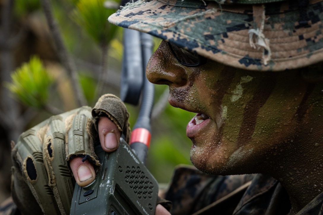 U.S. Marine Corps Sgt. Joshiwa Juni, a squad leader with 2nd Battalion, 23rd Marines, forward deployed with 4th Marine Regiment, 3d Marine Division as part of the Unit Deployment Program, communicates to another squad using an AN/PRC-152A radio during the Korean Marine Exercise Program 25.2 in Pohang, South Korea, August 5, 2025. KMEP is conducted regularly between the ROK and U.S. Marine Corps to increase their combined capabilities through realistic training geared towards deterrence and maintaining peace in the Indo-Pacific. (U.S. Marine Corps photo by Lance Cpl. Van Hoang)